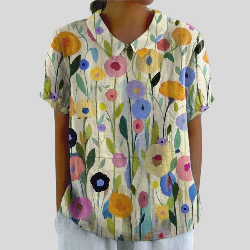 Solène | Blus med blommigt grafiskt tryck