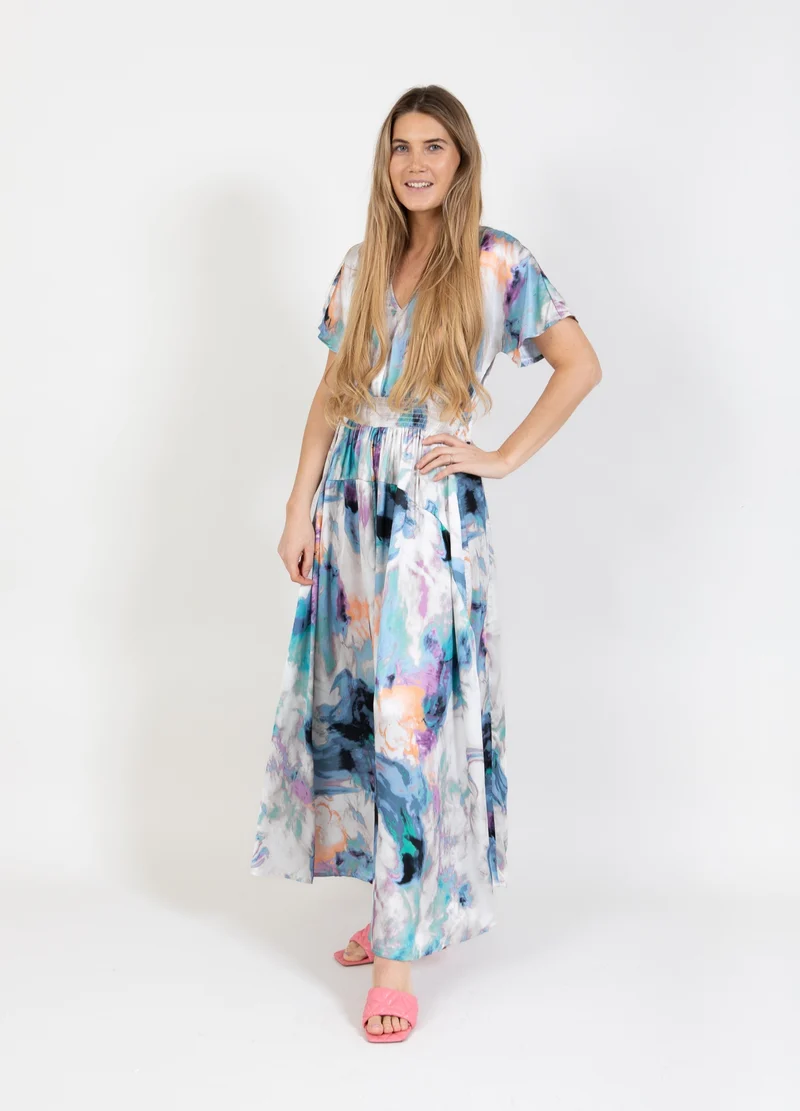 KLÄNNING MED SMOCKMIDJA I VIRVELMÖNSTER - Swirl print