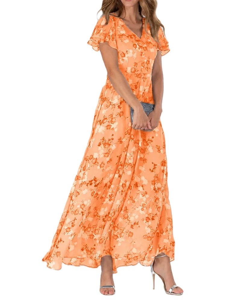 Dam Sommarklänning med Blommigt Mönster och Elegant Silhuett