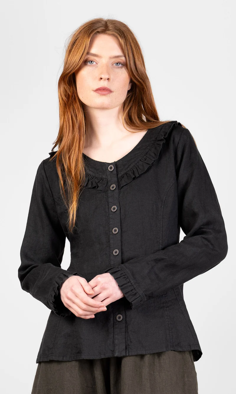 Blus med volanger och knäppning