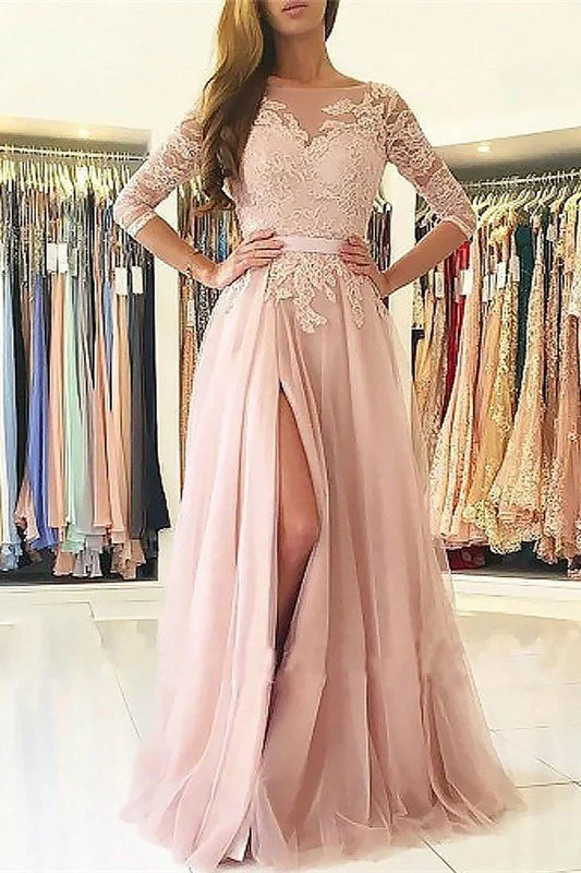 Elegant rosa balklänning med 3/4-ärmar och slits till låren