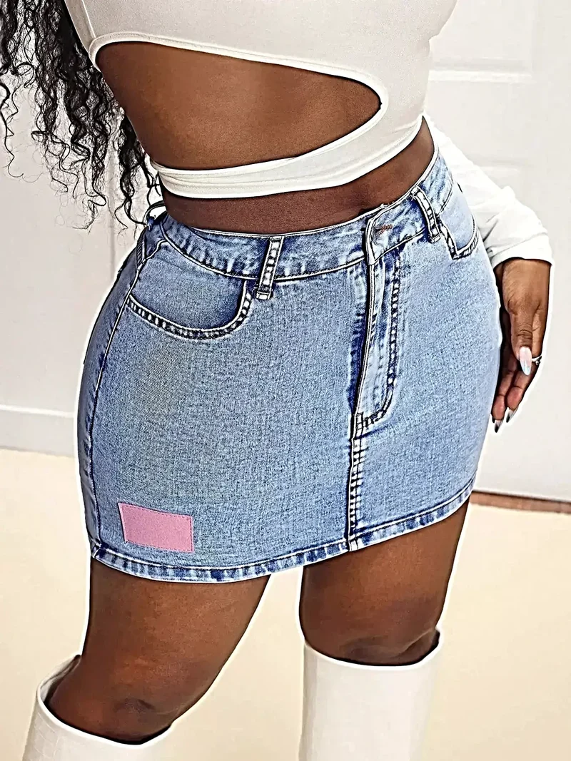 Elegant denimkjol med hög midja och fickor - Något stretchig, mångsidig moderiktig stil