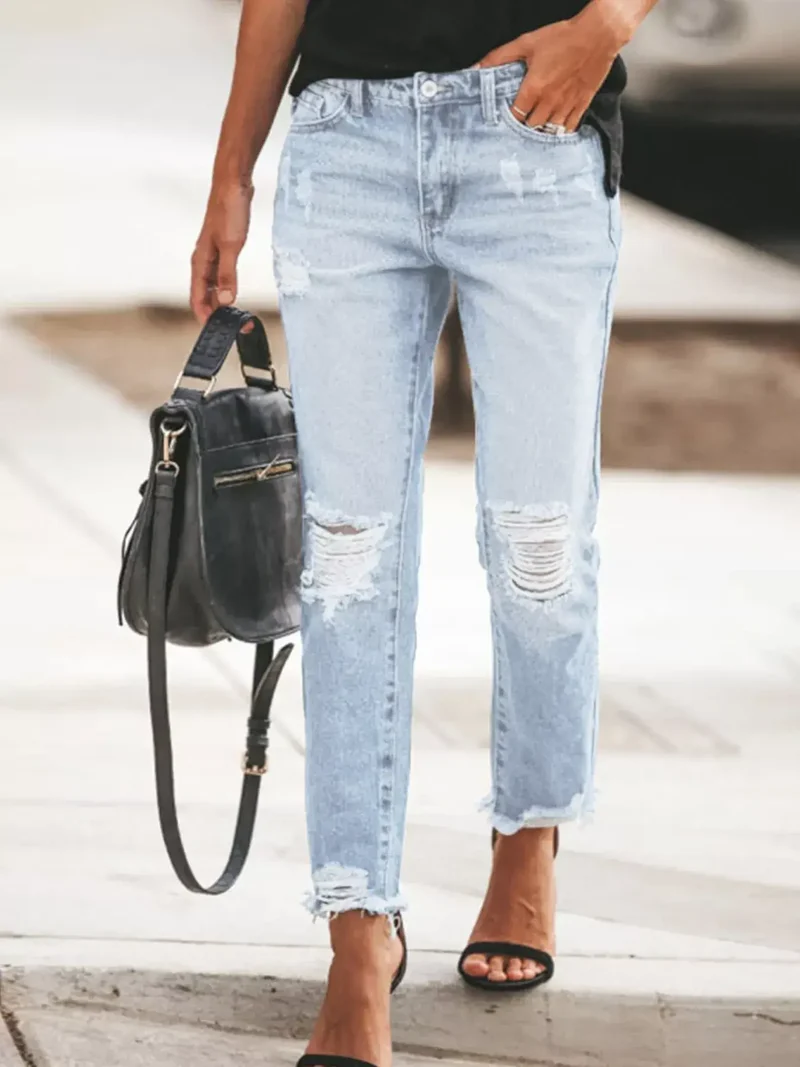 Förhöj din stil med slitna ankeljeans med rå fåll – 85 % bomullsblandning