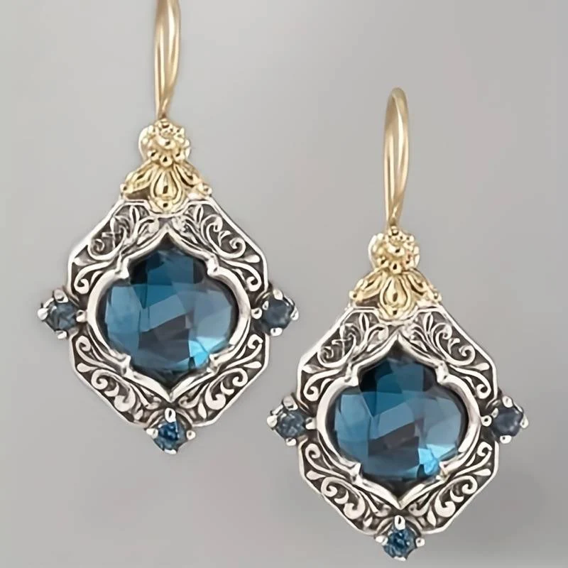 Vintageörhängen i blått glas, guld- och silverton