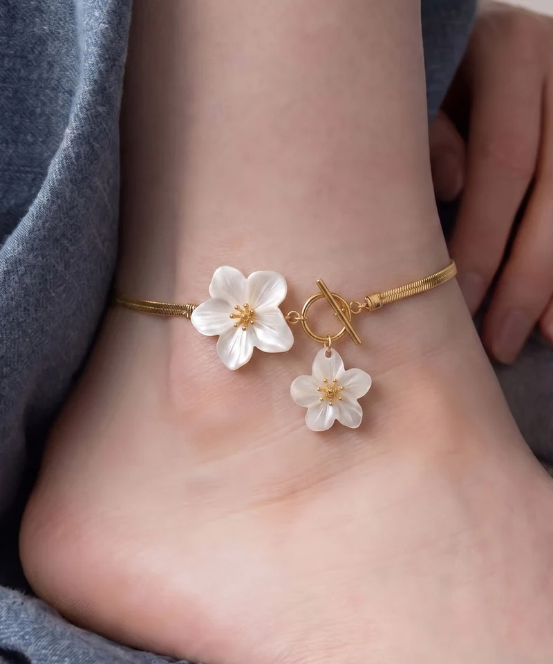 Armband med blomdesign i kopparlegering