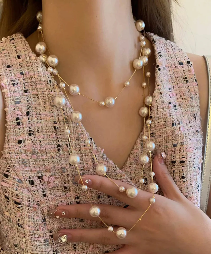 Dam Halsband med Pärlor och Tofsar i Graduering