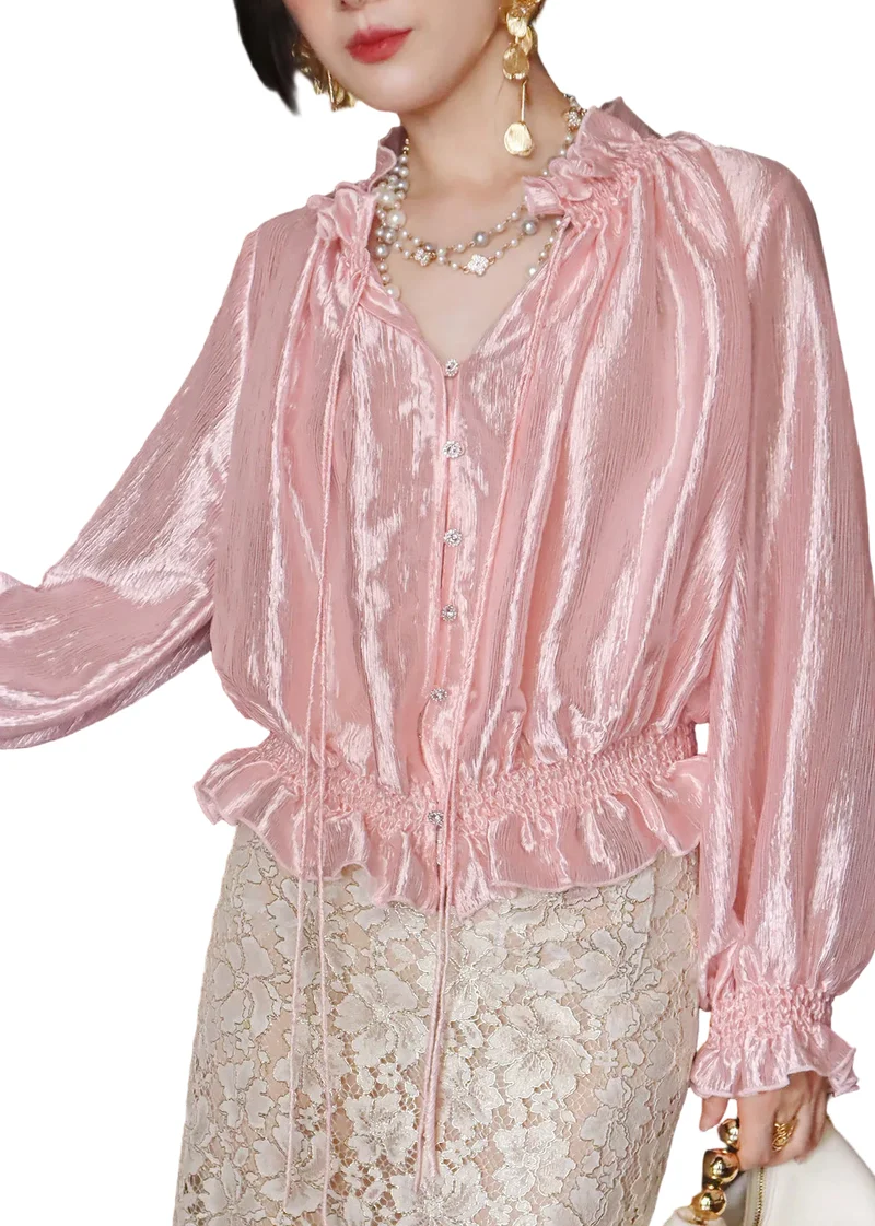 Damblus med volang och knappdetaljer i patchworkstil