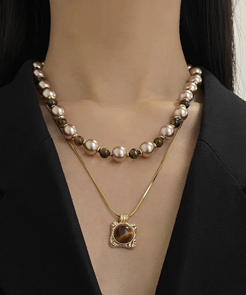 Damhalsband Graderad Design med Tigeröga Pärlor