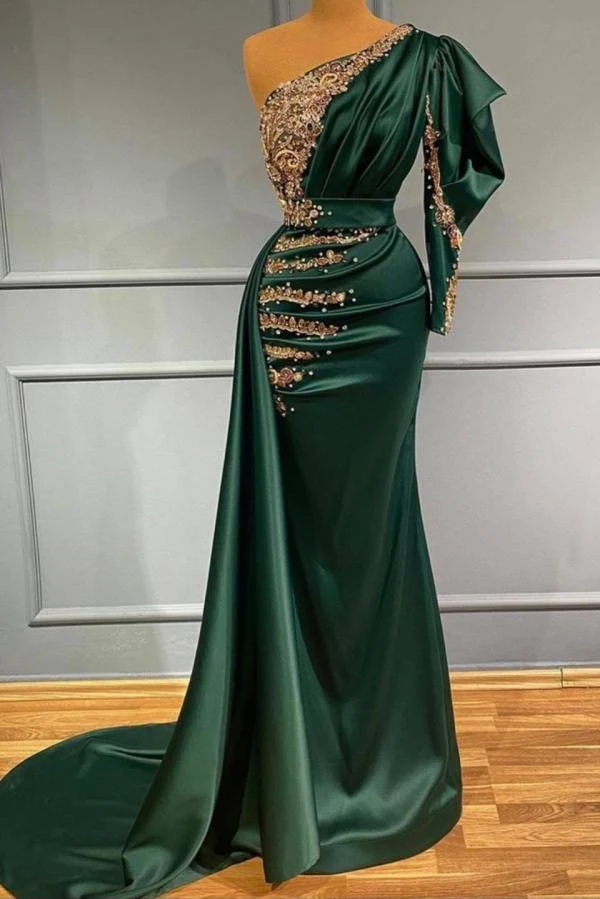 Elegant mörkgrön sjöjungfrubalklänning med en axel och gulddekorationer