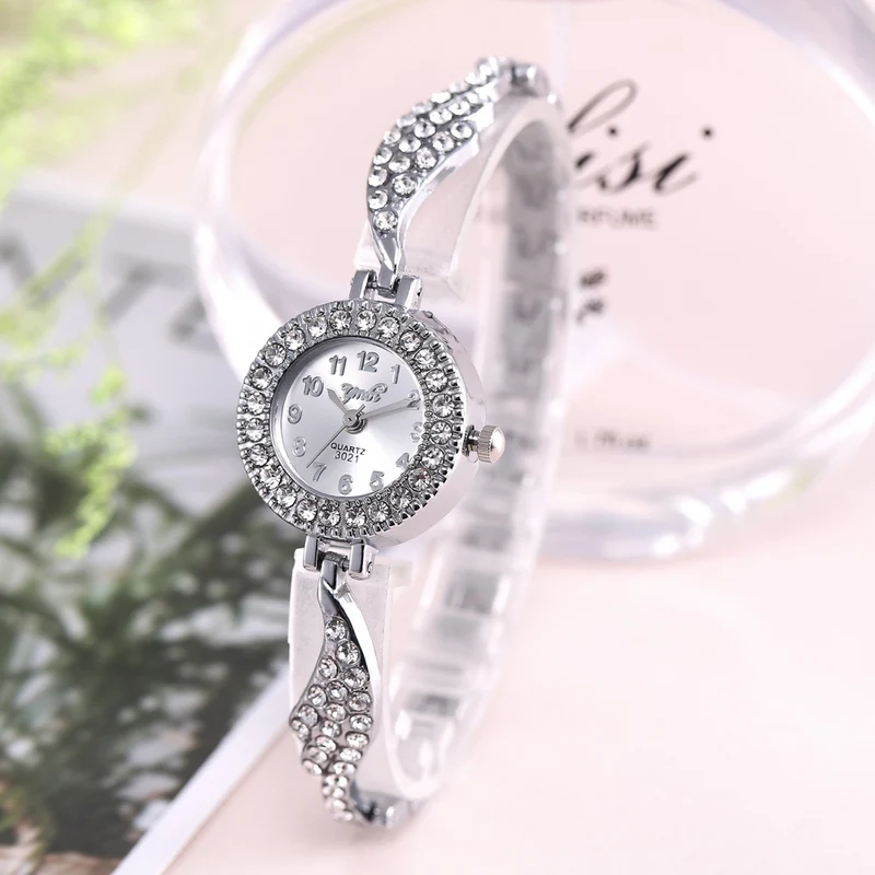Wish new ladies alloy watch ladies fashion full diamond wing bracelet bracelet quartz watch on behalf of