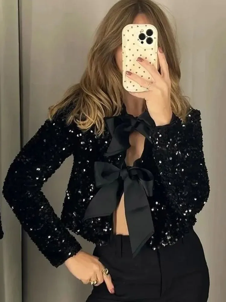 Imani™ | Glitterig rosettopp