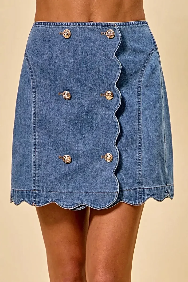 Snygg denimkjol med vågig fåll och knappar framtill - Feminin stil och bekväm passform