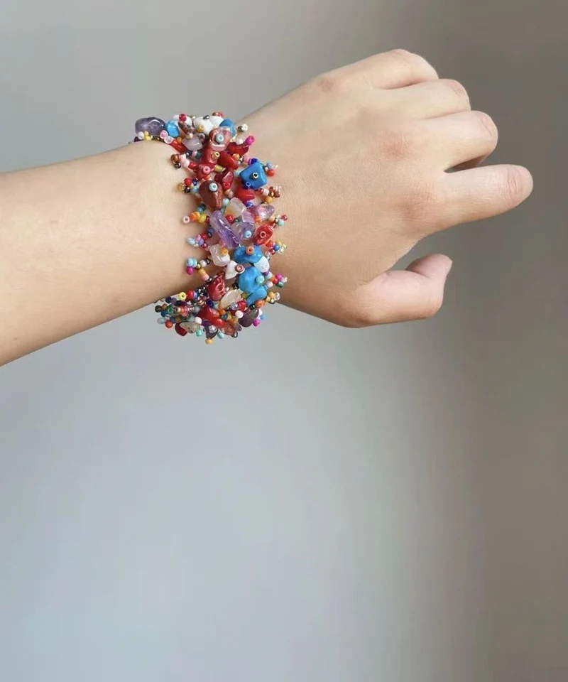 Damarmband med Regnbågsmönster och Asymmetrisk Design