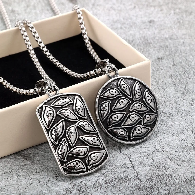 Herrhalsband med flera ögon i punkstil