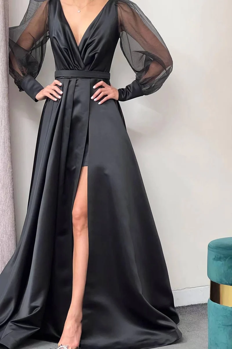 Elegant lång puffärmad A-linjeformad aftonklänning med slits i lår