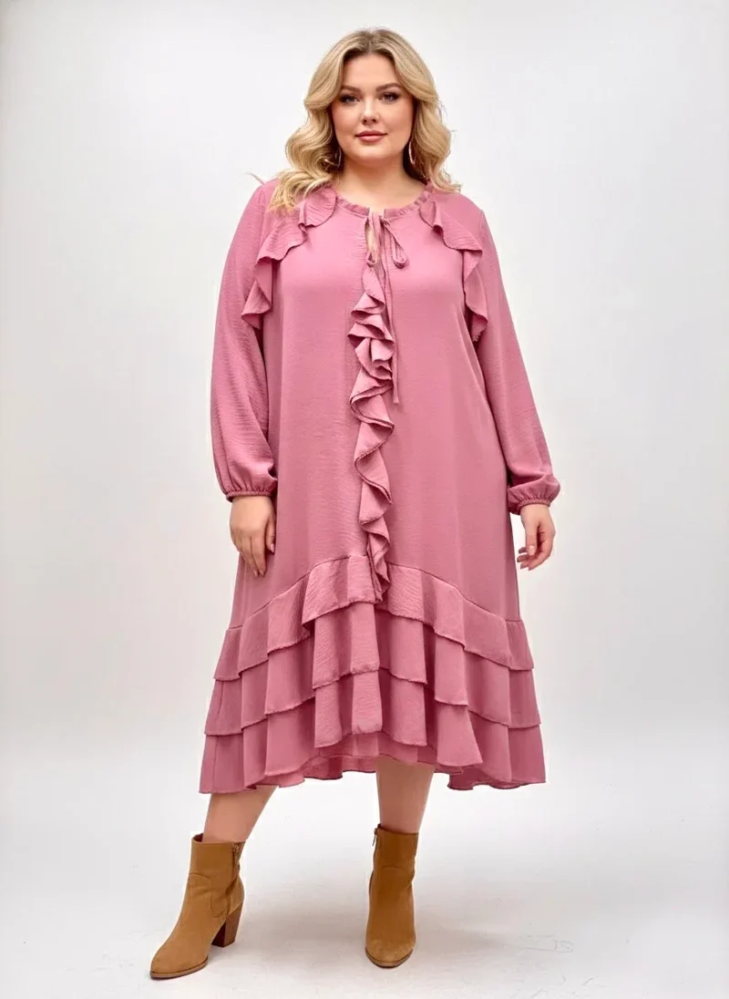 Klänning med volanger rosa